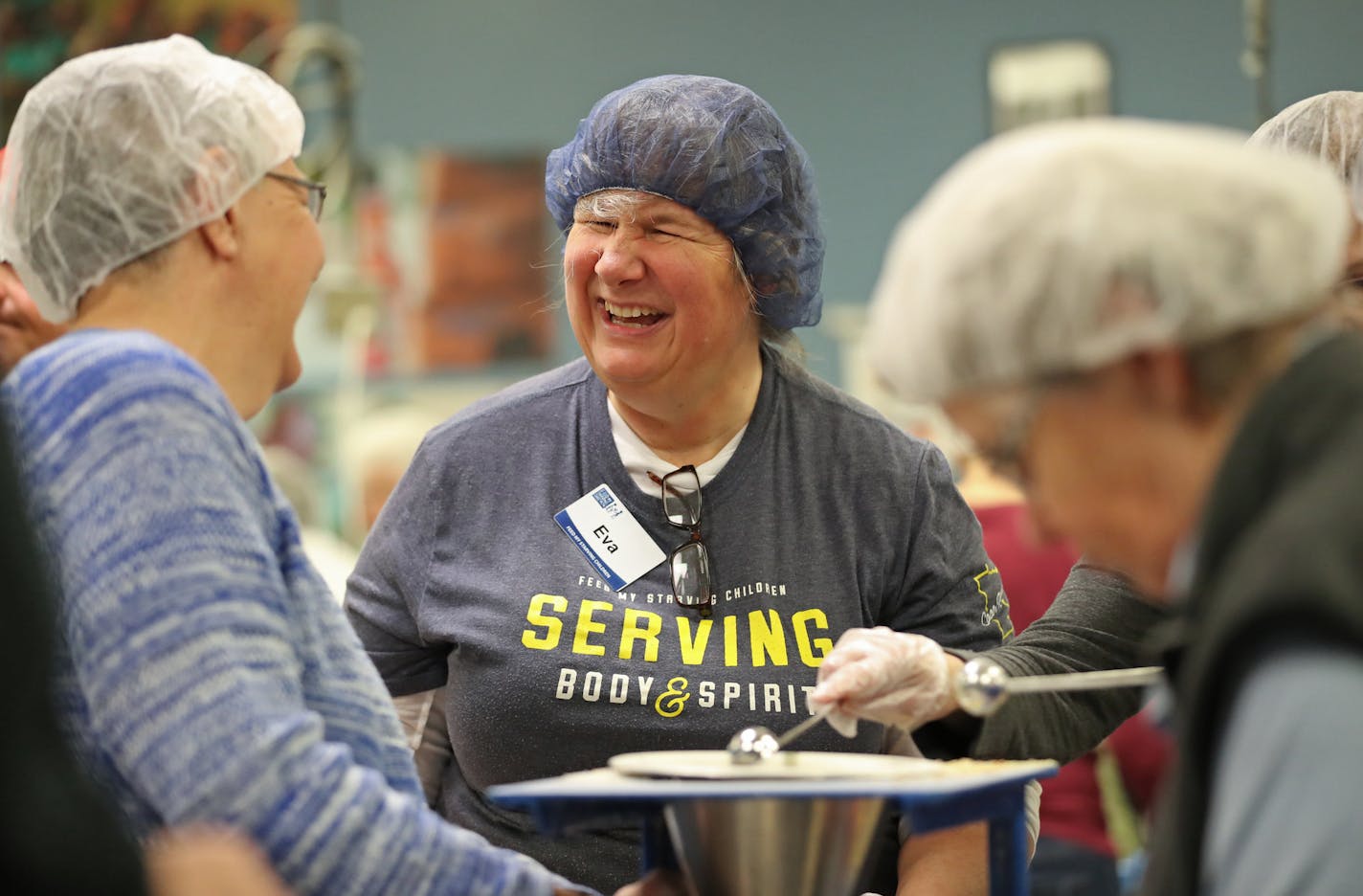 Several groups gathered at the workstation tables inside Feed My Starving Children in Coon Rapids on Give To The Max day. FMSC received an additional $3,000 for finishing in second place during Give To The Max 'Power Hour.' According to FMSC's Gary Young, that money alone will feed 37 children a meal every day for a year. Eva Karp calls working at FMSC "her fourth career. And this one's sticking." ] Shari L. Gross &#xef; shari.gross@startribune.com Give to the Max Day turns 10. On Thursday, Nov.