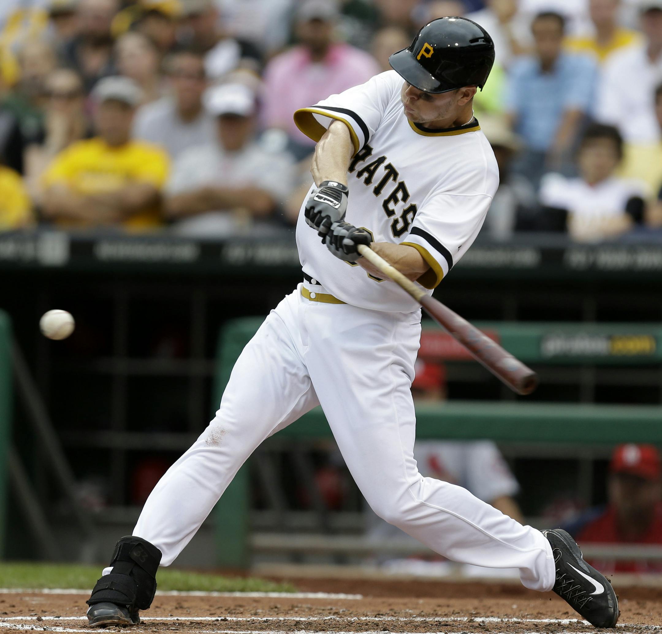 Pittsburgh Pirates' Justin Morneau grounds out in his first at-bat with the Pirates during the second inning of a baseball game against the St. Louis Cardinals in Pittsburgh Sunday, Sept. 1, 2013. (AP Photo/Gene Puskar)