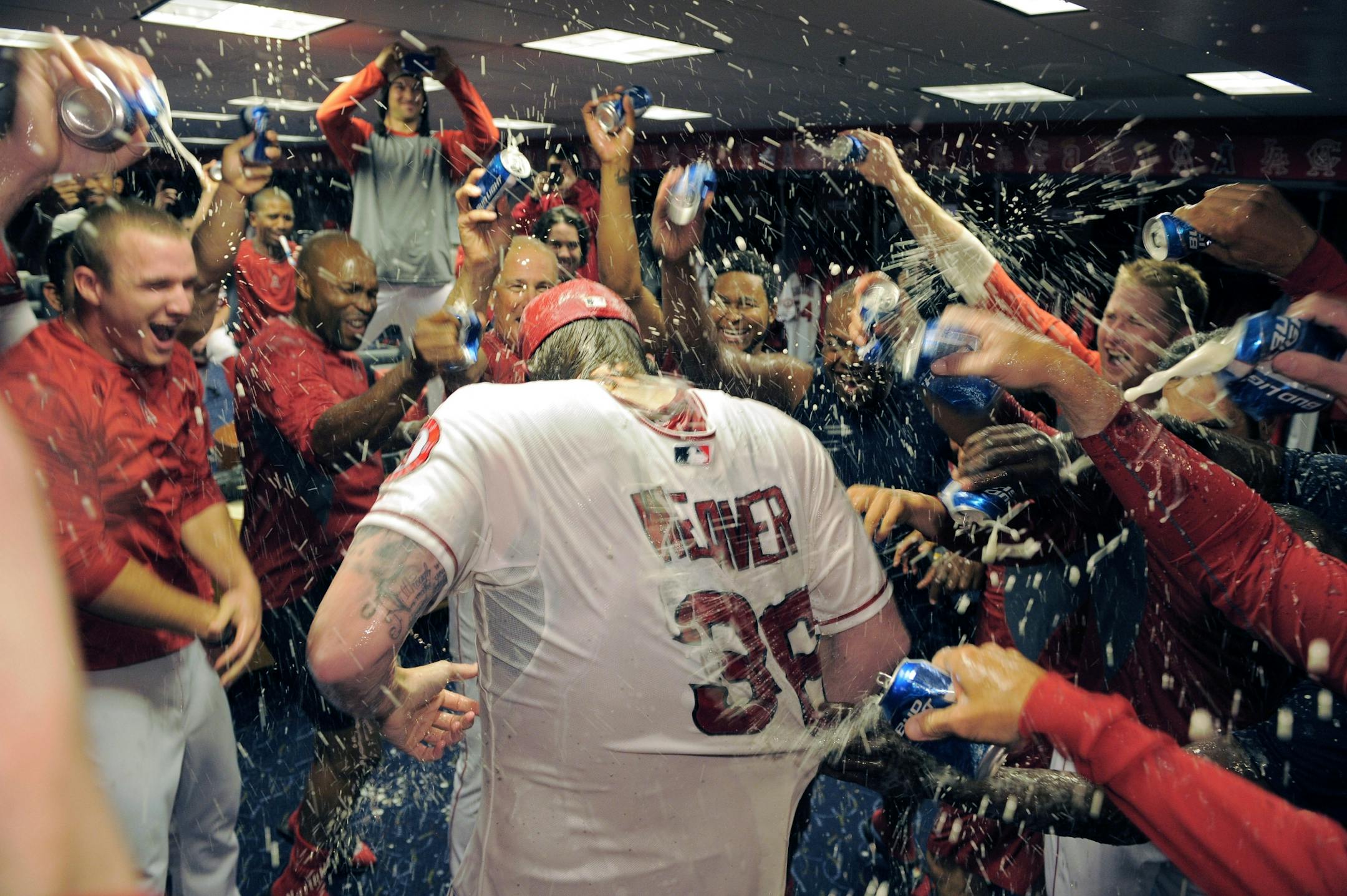Los Angeles Angels starting pitcher Jered Weaver is doused by teammates after pitching a a no-hitter in their baseball game against the Minnesota Twins, Wednesday, May 2, 2012, in Anaheim, Calif. The Angels won 9-0.