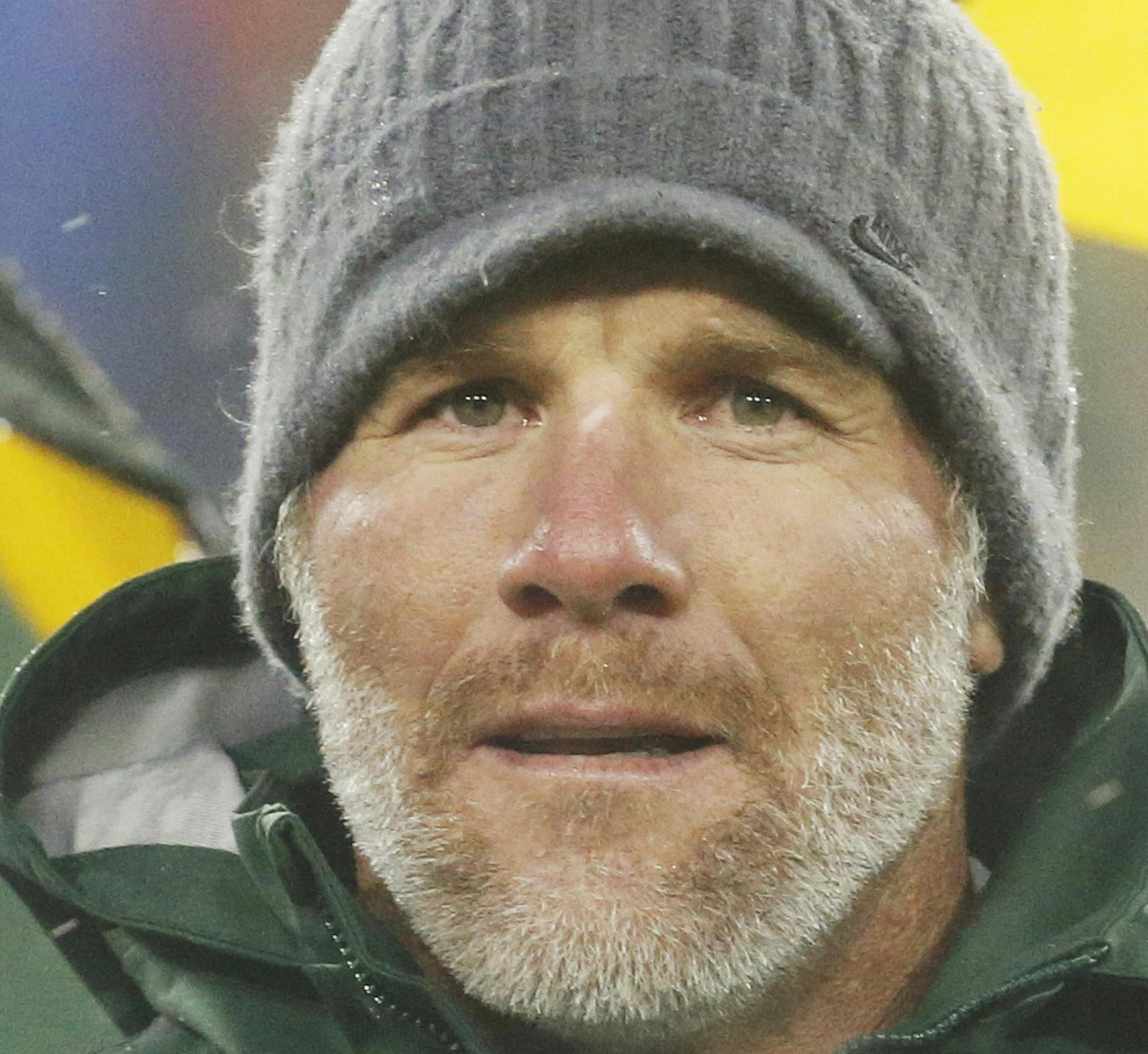 Brett Favre speaks during a ceremony at halftime of an NFL football game between the Green Bay Packers and Chicago Bears Thursday, Nov. 26, 2015, in Green Bay, Wis. Favreís retired No. 4 and name were unveiled inside Lambeau Field during the ceremony. (AP Photo/Mike Roemer)