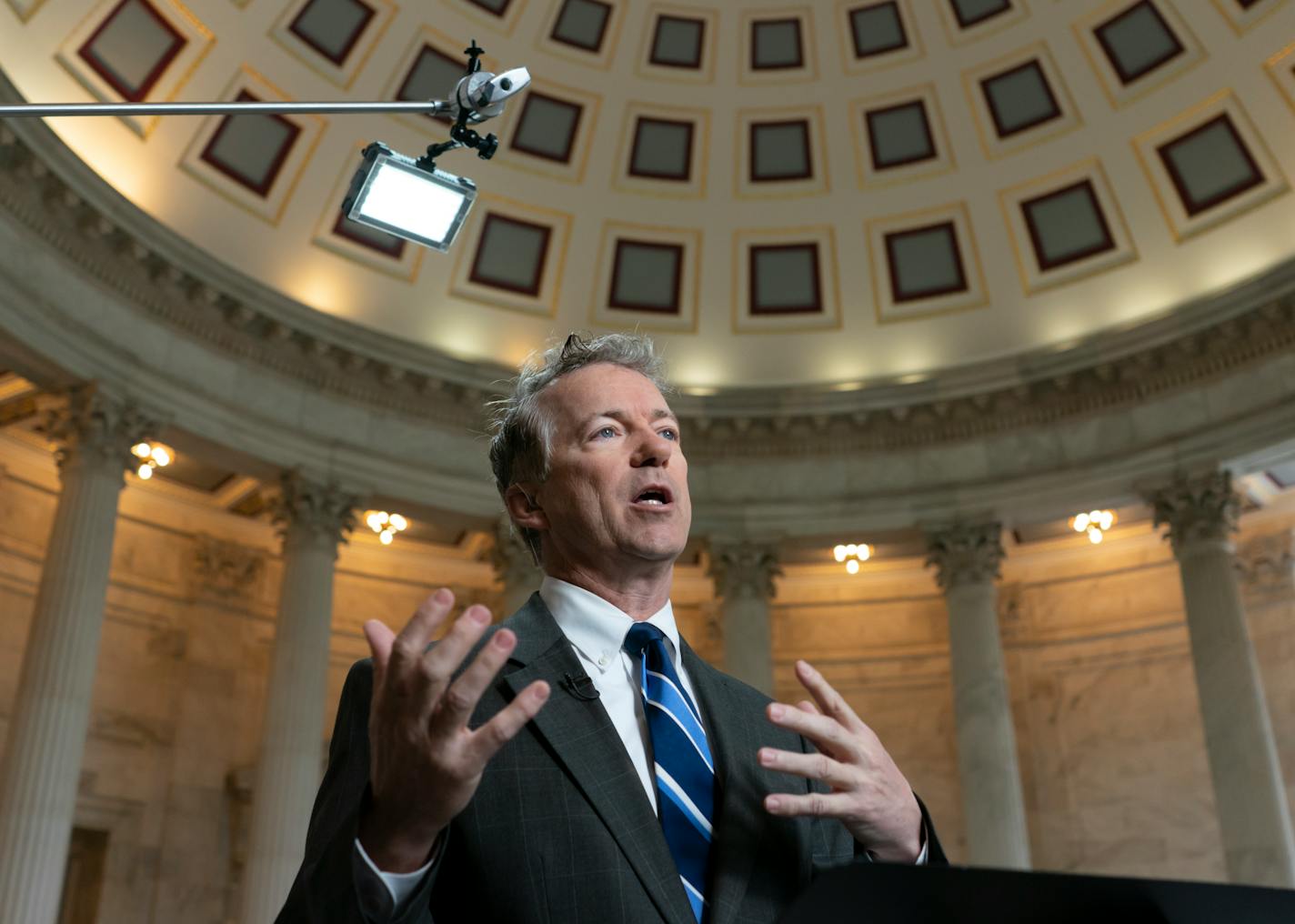 FILE - In this April 24, 2018, file photo, Sen. Rand Paul, R-Ky., a member of the Senate Foreign Relations Committee, speaks during a TV news interview on Capitol Hill in Washington. Paul says he and his family were targeted by someone threatening to attack them with an ax. He told reporters Monday, July 2, in his home state of Kentucky that Capitol Police issued an arrest warrant for a suspect. Then in a tweet, Paul thanked Capitol Police for arresting the suspect. (AP Photo/J. Scott Applewhite