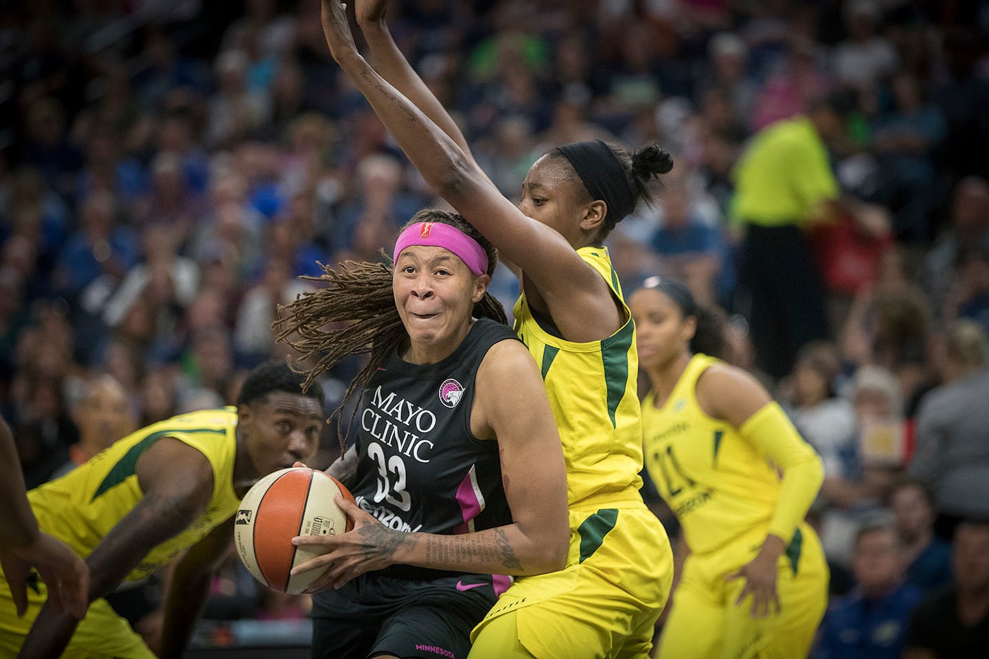 Lynx guard Seimone Augustus drove by Seattle's Jewell Loyd last August