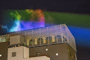Last summer, the team of artists did a test run and projected lights onto the steam plume at District Energy in St. Paul.