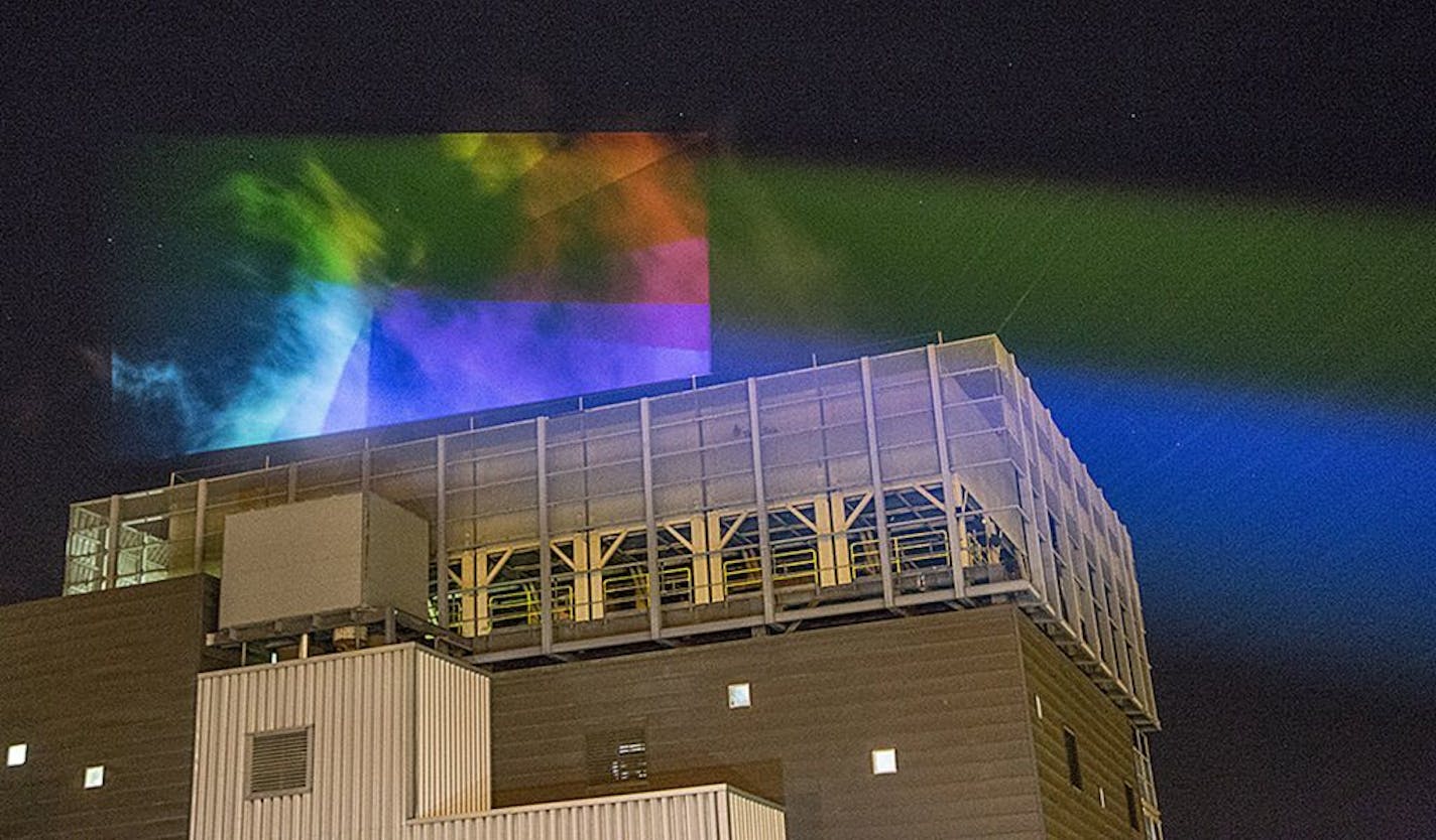 Last summer, the team of artists did a test run and projected lights onto the steam plume at District Energy in St. Paul.