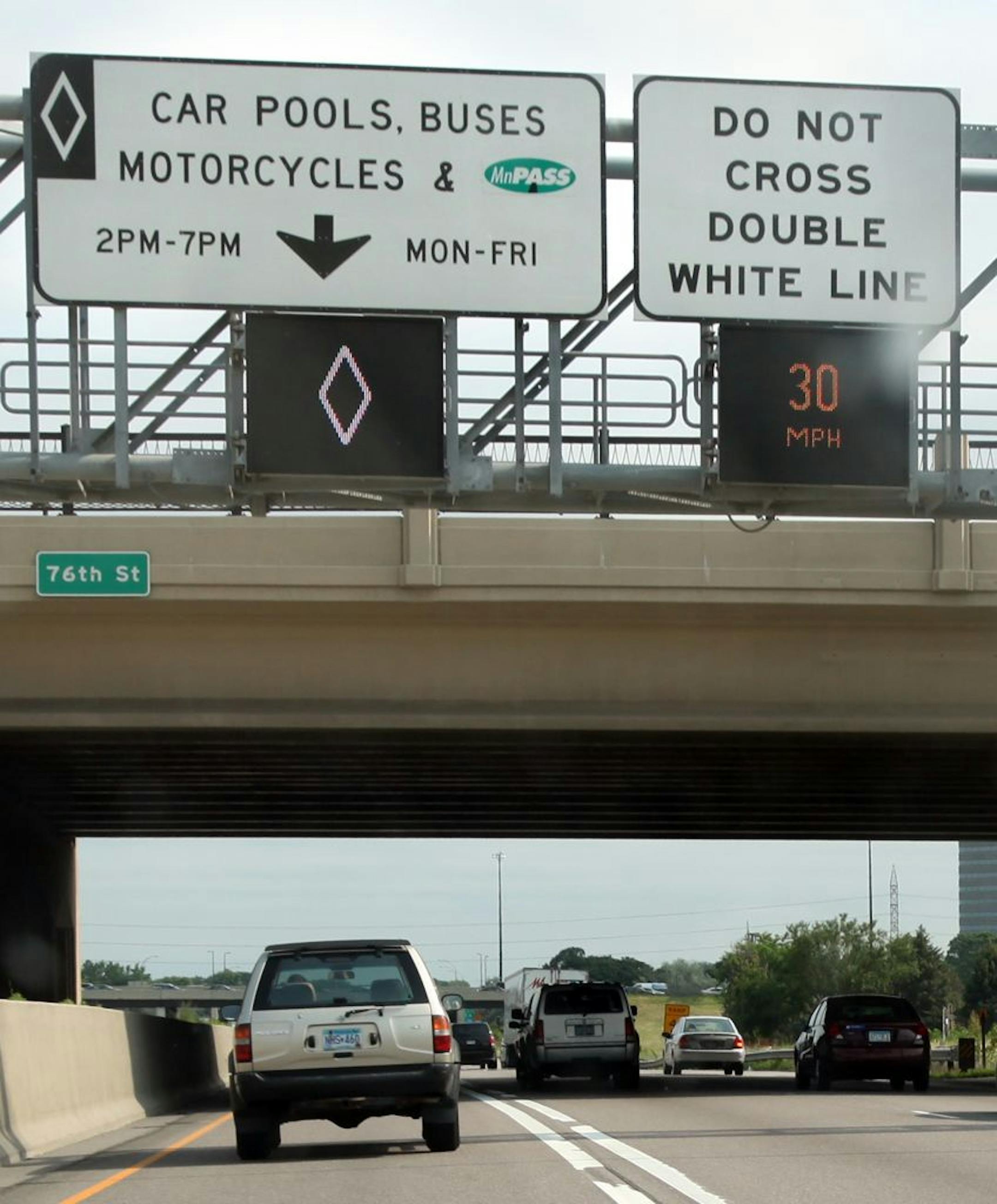 An SUV drove in the carpool/MnPASS lane during rush hour Monday afternoon.