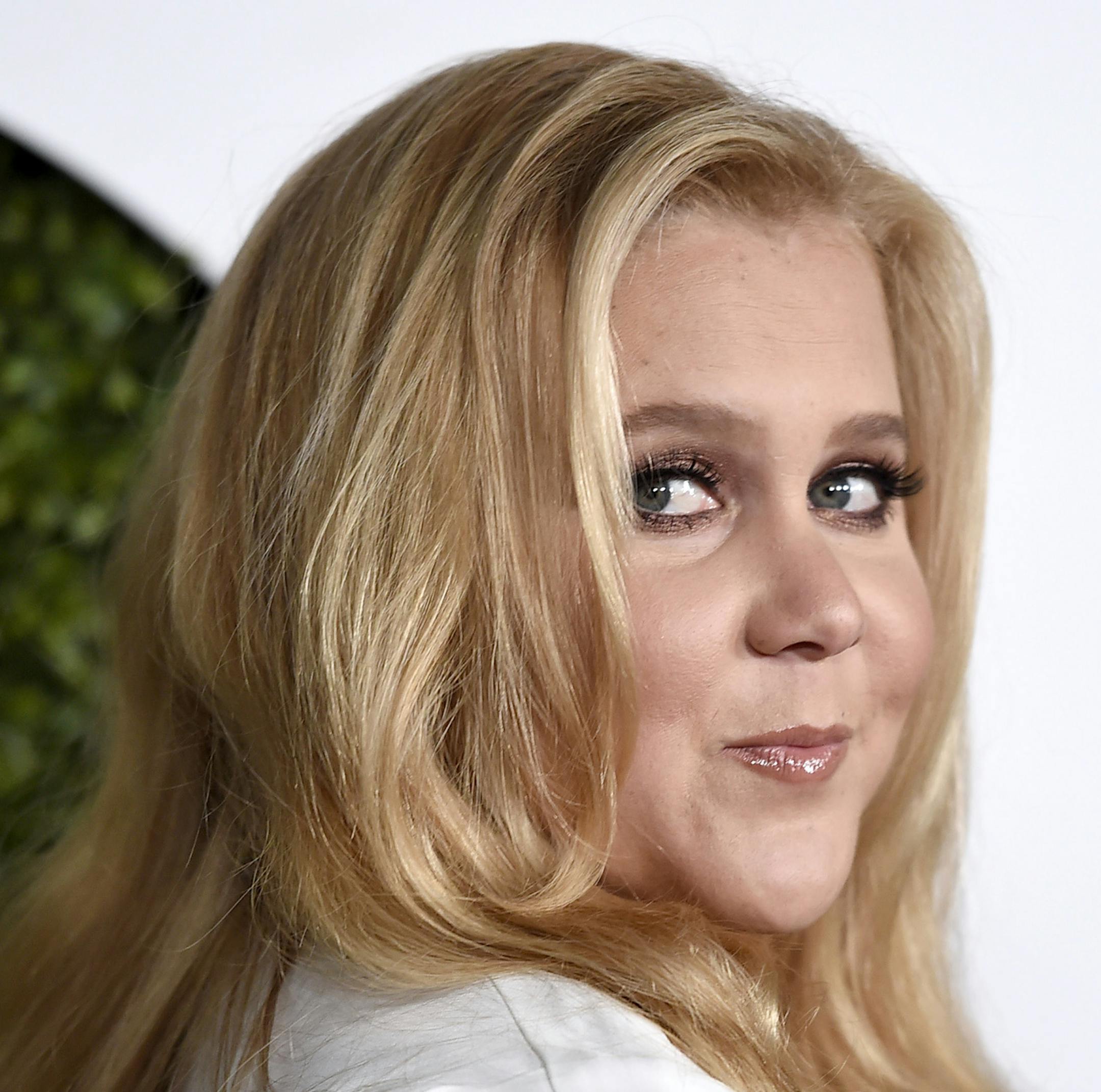 FILE - In this Dec. 3, 2014 file photo, Amy Schumer arrives at the GQ Men of the Year Party in Los Angeles. Schumer, Tracy Morgan and ballerina Misty Copeland are on Barbara Walters' list of the most fascinating people of the year. The person deemed the most fascinating of all will be announced on "Barbara Walters Presents: The 10 Most Fascinating People of 2015." The 90-minute special airs 9:30 p.m. EST Thursday on ABC. (Photo by Jordan Strauss/Invision/AP, FIle)