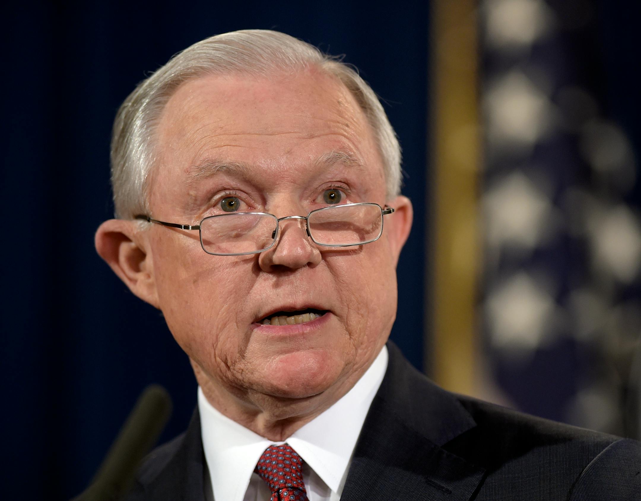 FILE - In this Sept. 5, 2017 file photo, Attorney General Jeff Sessions makes a statement at the Justice Department in Washington. Sessions said Thursday he is reviving a Bush era crime-fighting strategy that emphasizes aggressive prosecution of gun and gang crimes. (AP Photo/Susan Walsh)