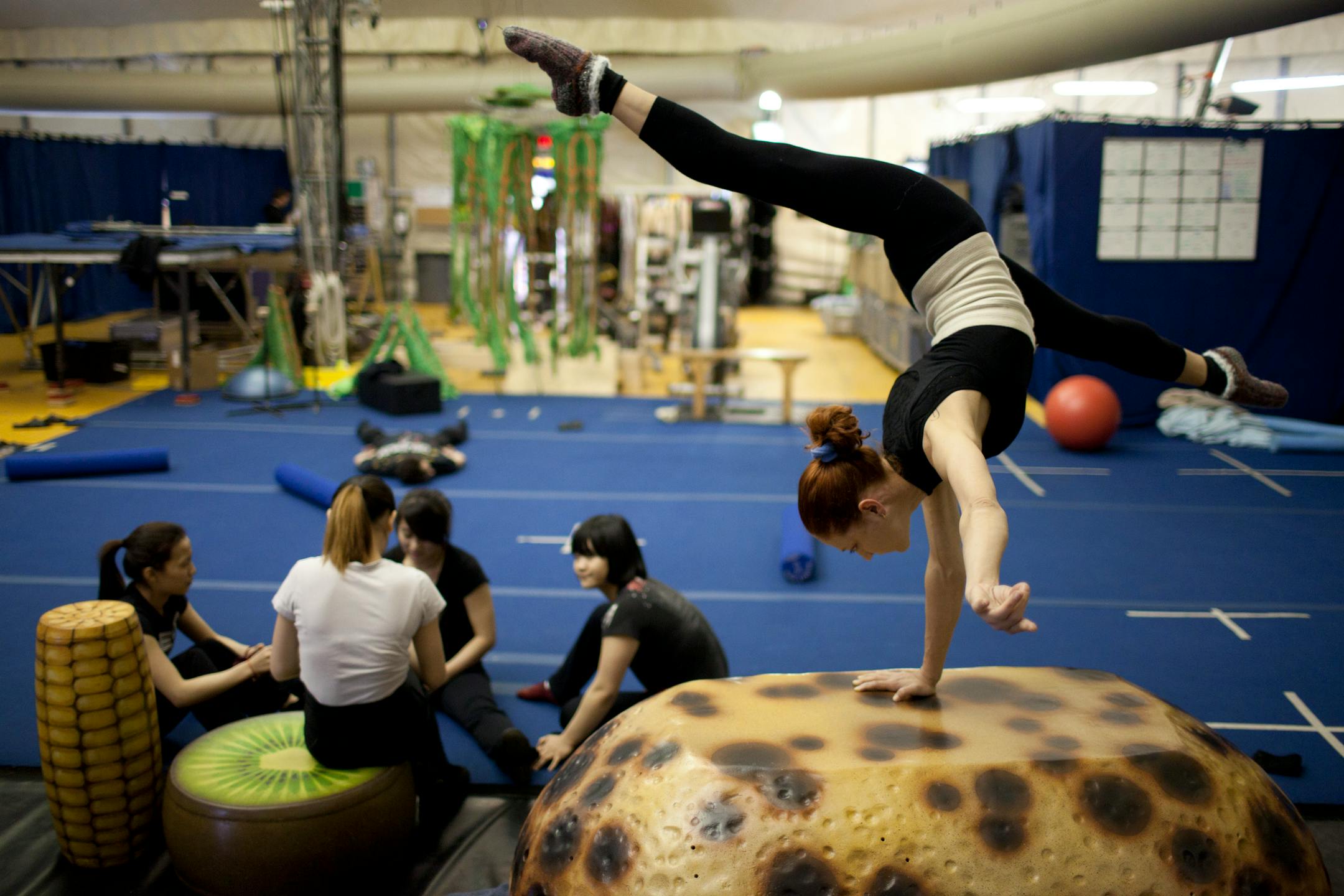 Svetlana Belova warmed up in the rehearsal tent for her role as one of the Web Spiders Wednesday afternoon.