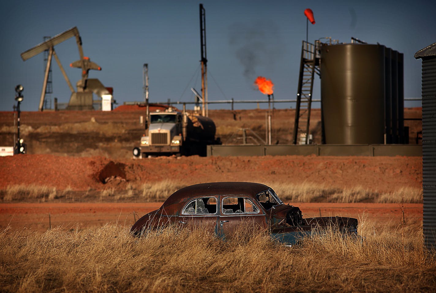 The landscape around Keene and throughout the Bakken oil fields reflects the change brought on by the boom. ] (JIM GEHRZ/STAR TRIBUNE) / October 23, 2013, Keene, ND &#x201a;&#xc4;&#xec; BACKGROUND INFORMATION- PHOTOS FOR USE IN SECOND PART OF NORTH DAKOTA OIL BOOM PROJECT: Rounding up of cattle and branding calves is a tradition handed down through generations of North Dakotans in the spring each year. Families take turns helping one another carry out the arduous, annual rite all over the state,