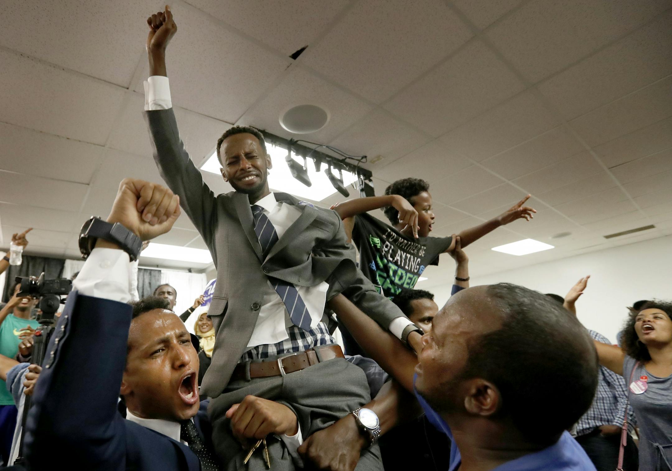 Supporters of Ilhan Omar celebrated after getting the election results at Kalsan in Minneapolis.
