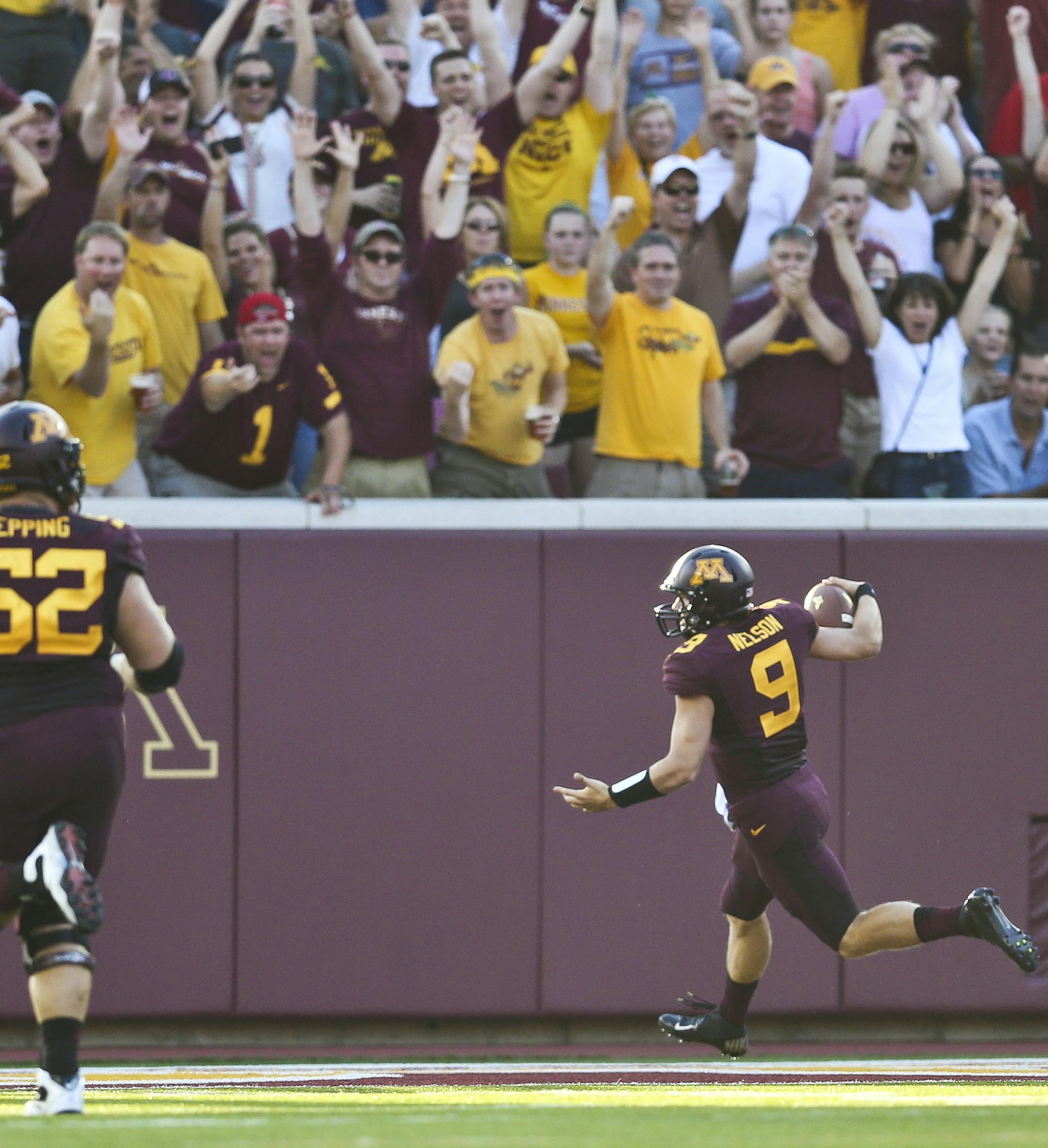Minnesota Golden Gophers quarterback Philip Nelson (9) scored a touchdown in the second quarter during the Minnesota Gophers vs. UNLV in the season opener at TCF Bank Stadium at the University of Minnesota in Minneapolis, Minn., on Thursday, August 29, 2013. ] (RENEE JONES SCHNEIDER &#x2022; reneejones@startribune.com)