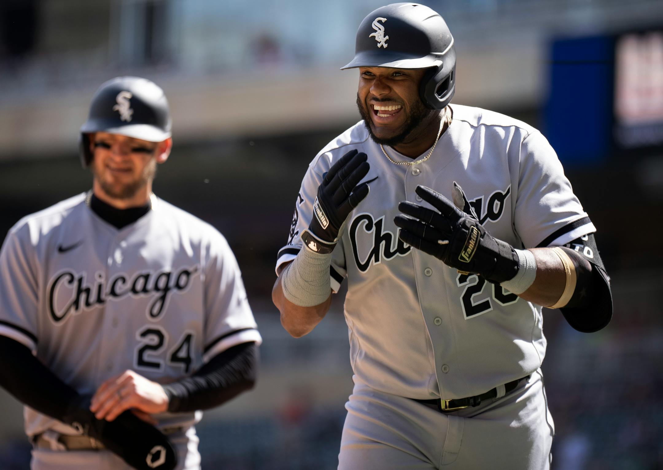 Chicago White Sox shortstop Hanser Alberto, right, celebrates his three run homer in the fourth inning off Minnesota Twins starting pitcher Kenta Maeda Monday afternoon at Target Field in Minneapolis.