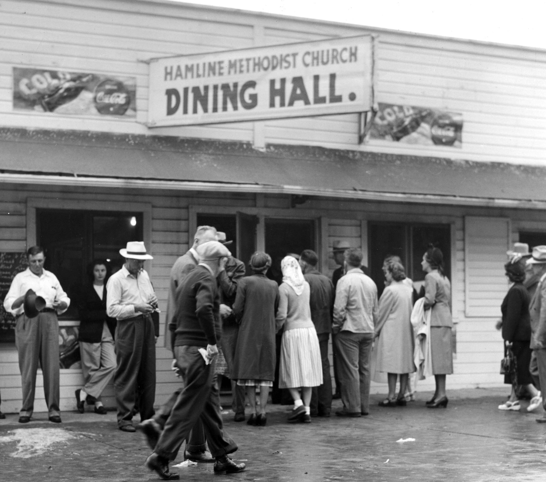 People come and go from the Hamline Methodist Church Dining Hall in 1948.