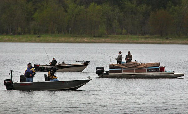 Last year's opener on South Lindstrom Lake drew a crowd of fishermen, as anglers braved cool temperatures and rain.