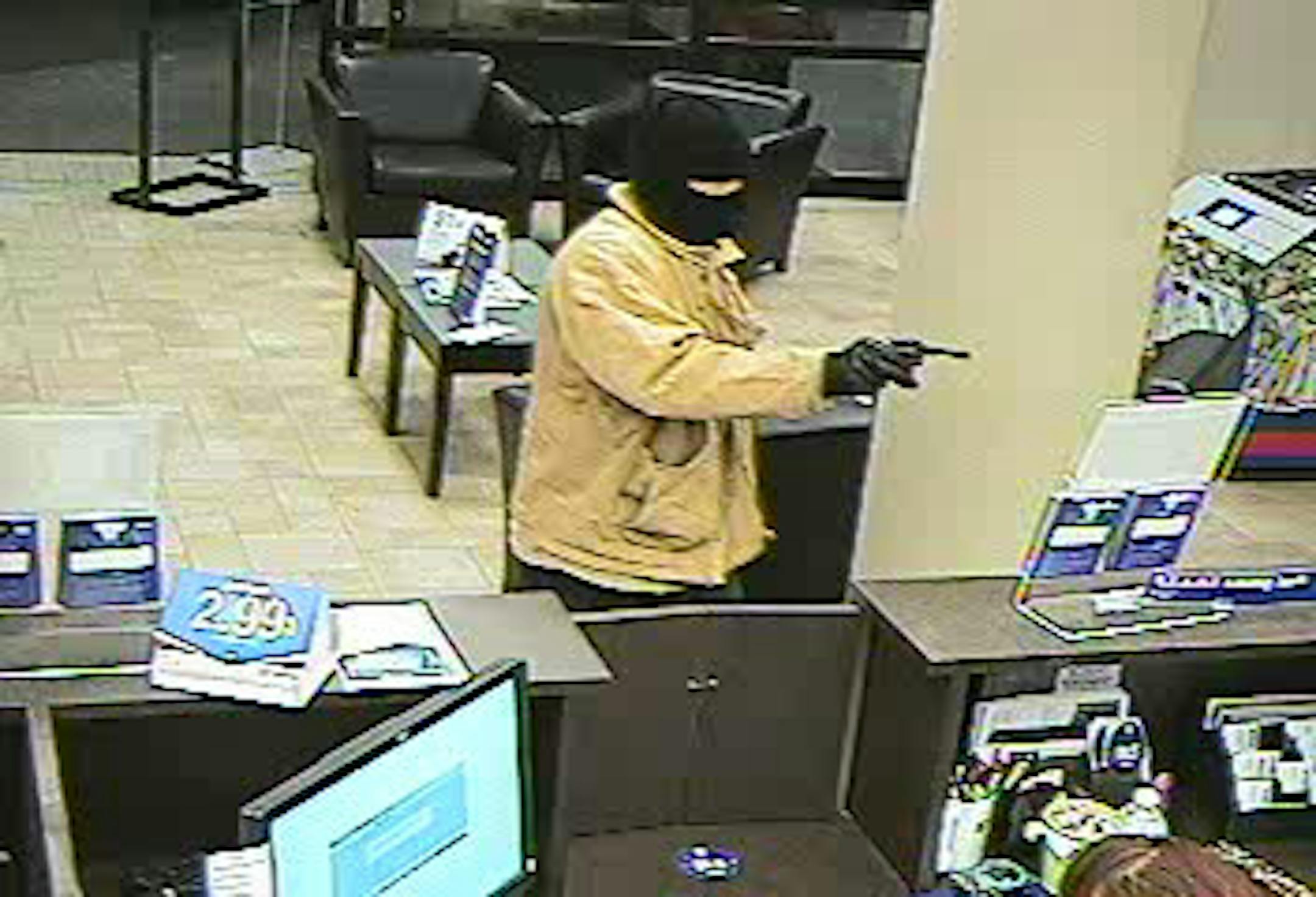 The so-called Man in Black lightened up his wardrobe before robbing a Hopkins bank on Monday.