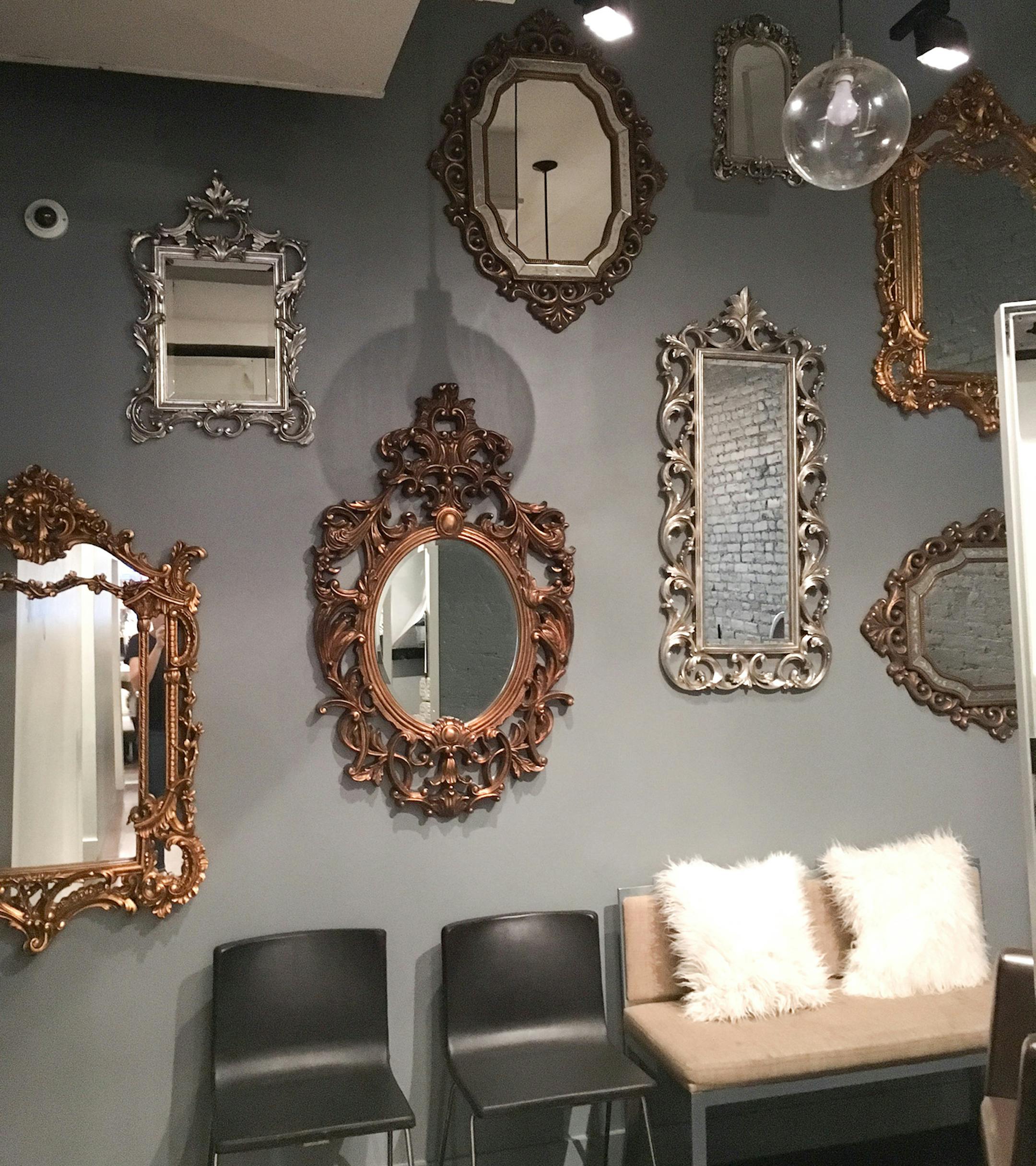 A mix of ornate mirrors of different sizes and finishes create an interesting look in the back of a hair salon. (Handout/TNS) ORG XMIT: 1195071