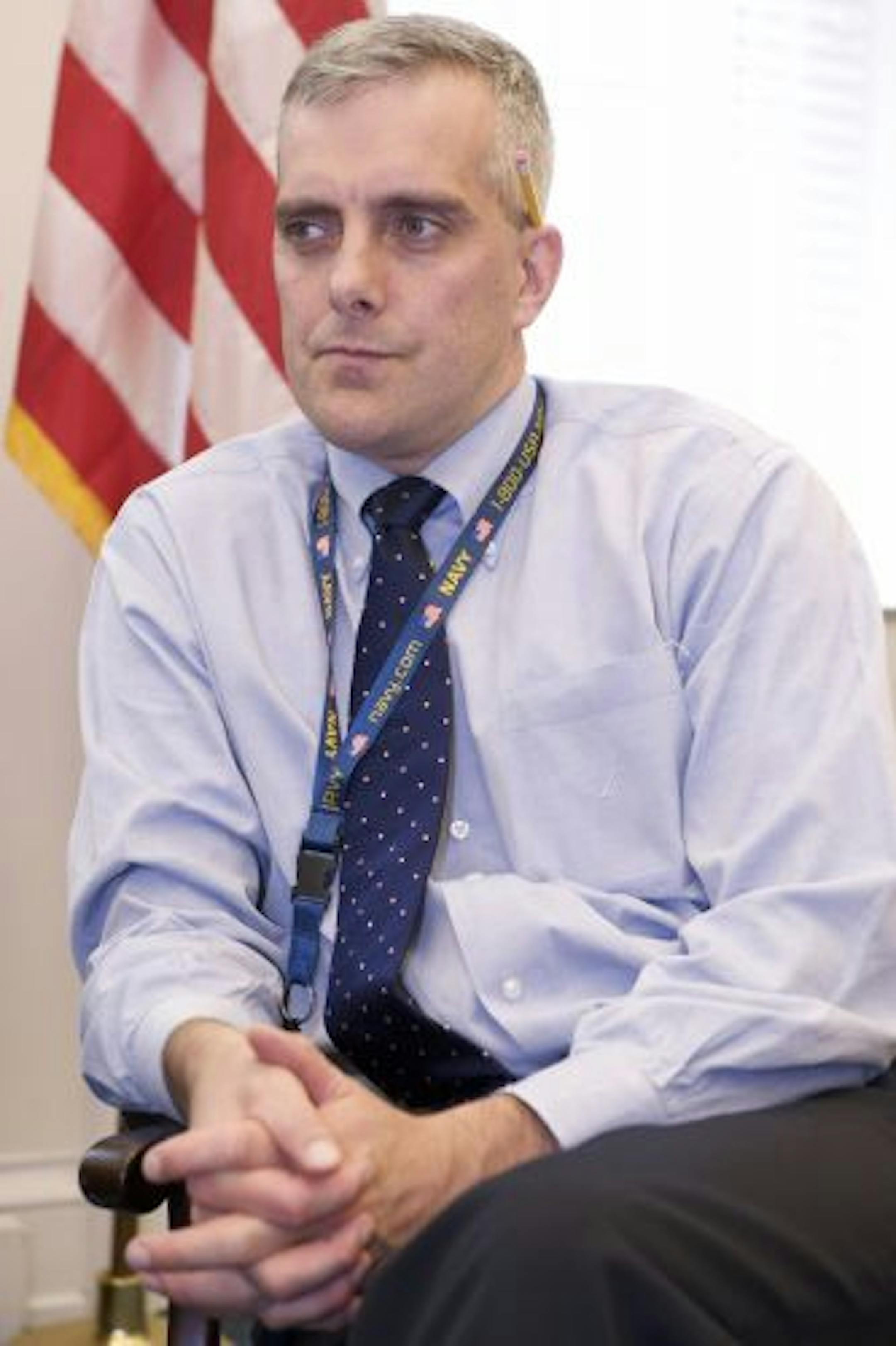 A key player: McDonough's principal job is to coordinate what Obama says on foreign policy, but the Stillwater native, above, also joins him on the basketball court.