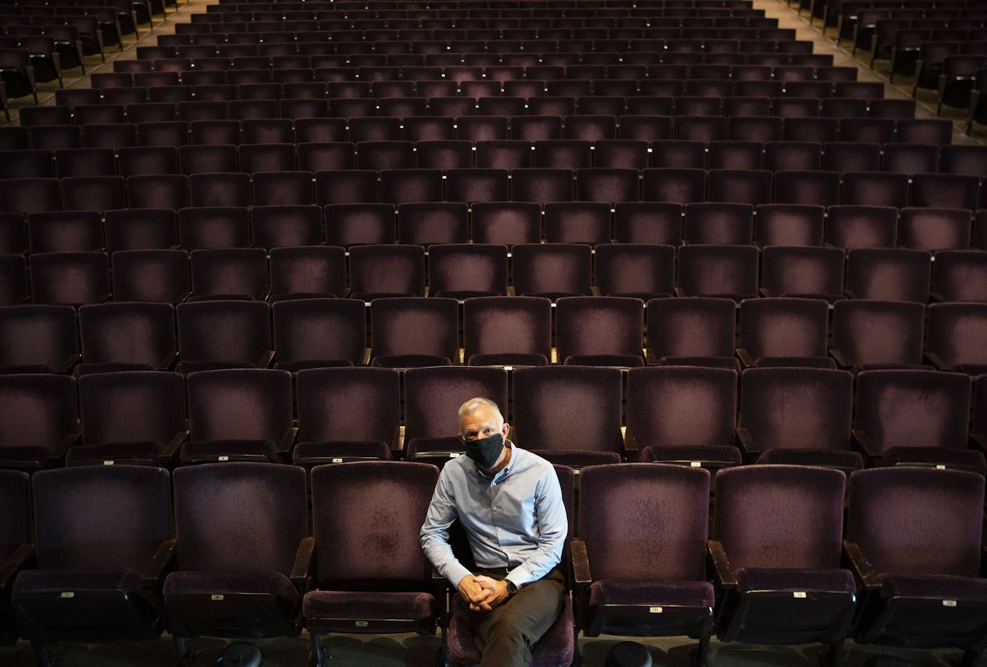 Roger Reinert, the interim executive director of the DECC, posed for a portrait among empty seats in the Symphony Hall on Thursday morning. ] ALEX KORMANN • alex.kormann@startribune.com The DECC is a staple of Duluth's social sphere. It houses Amsoil Arena, home of the UMD men's and women's hockey teams as well as Symphony Hall and multiple convention spaces. The pandemic has taken it's financial toll on the DECC and left it virtually empty most days.