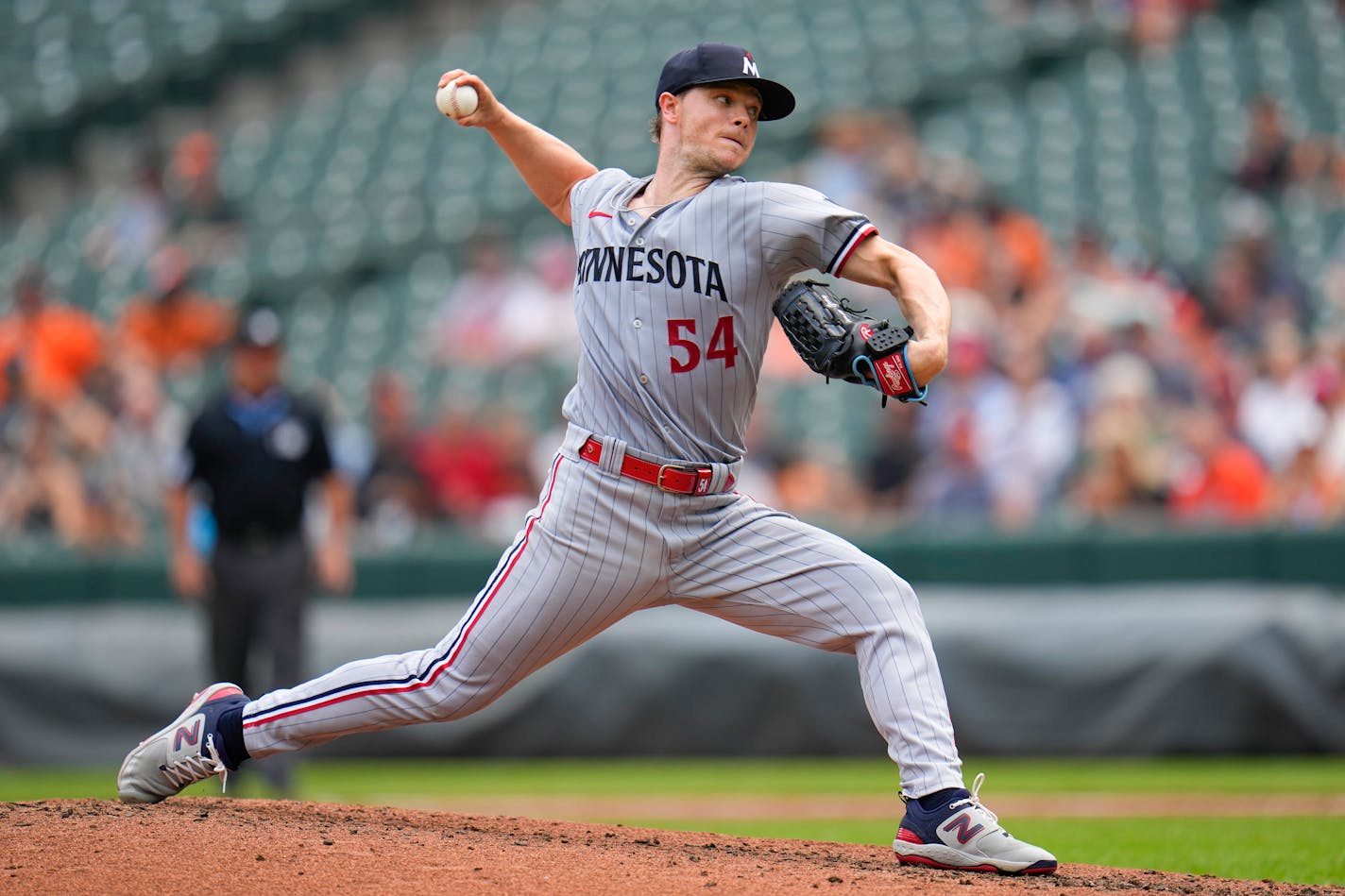 Minnesota Twins starting pitcher Sonny Gray throws a pitch to the Baltimore Orioles in the second inning of a baseball game, Sunday, July 2, 2023, in Baltimore. (AP Photo/Julio Cortez)