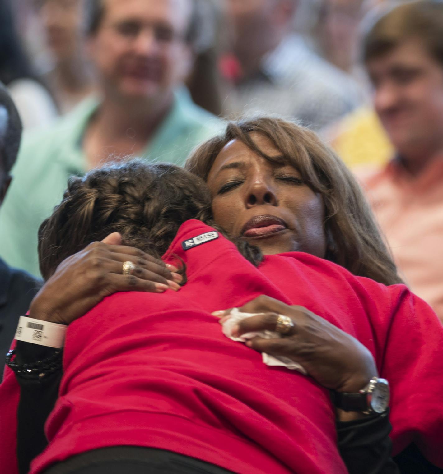 School president Donna Harris hugged ninth-grader Alexis Stanley as she arrived at a prayer service at the Minnehaha Academy Lower School in the evening on August 2, 2017 in Minneapolis, Minn. This morning there was an explosion that killed one, injured at least nine, and one person is still missing. "It's such a community," said Stanley, "It is a family. You just have to be there for each other." ] RENEE JONES SCHNEIDER &#x2022; renee.jones@startribune.com