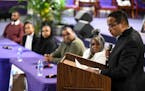 Attorney General Keith Ellison speaks at Shiloh Temple in Minneapolis on April 5, next to members of Zaria McKeever’s family. 