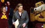 Gophers women's basketball coach Lindsay Whalen, seen walking into her introductory news conference