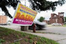 Pink and yellow lawn signs have begun to appear in front of homes and apartment buildings in North East Minneapolis. ] MARK VANCLEAVE &#xa5; The Safe 