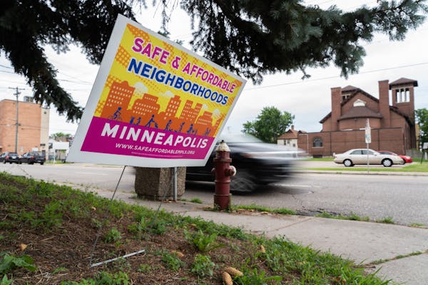 Pink and yellow lawn signs have begun to appear in front of homes and apartment buildings in North East Minneapolis. ] MARK VANCLEAVE &#xa5; The Safe 
