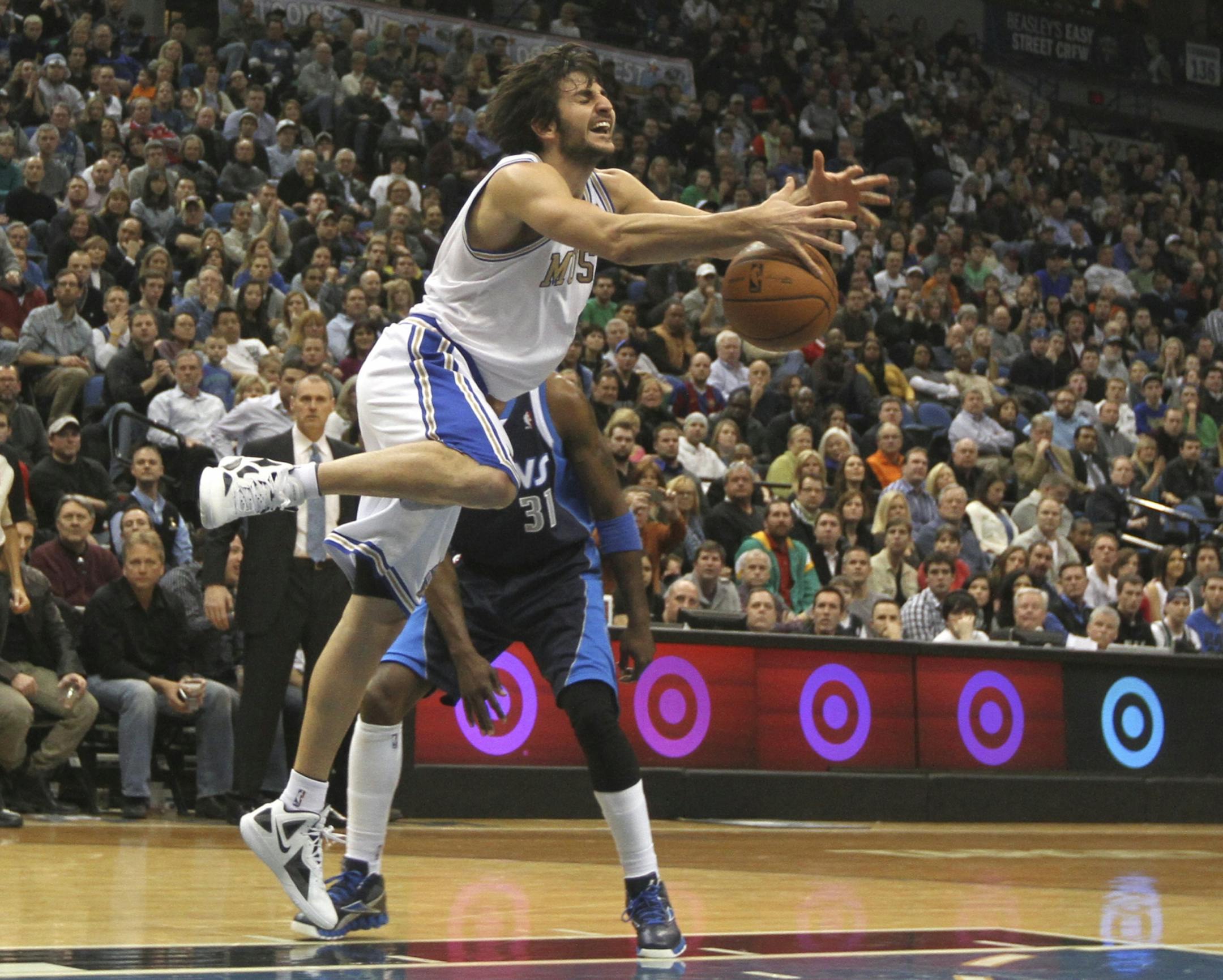 Ricky Rubio was fouled by Dallas' Jason Terry as he went to the basket last month.