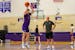 St. Thomas freshman walk-on Adam Tauer took a shot during summer practice, watched by his father, Tommies coach Johnny Tauer.