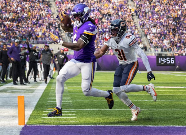 Vikings running back Dalvin Cook has 20 touches in each of the past two games, and scored two touchdowns Sunday against the Bears.