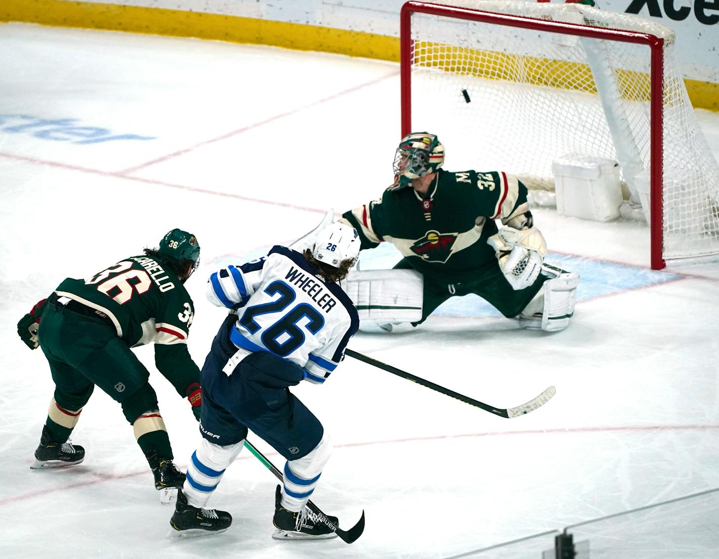 Winnipeg right wing Blake Wheeler got a shot past Wild goaltender Alex Stalock in the first period.