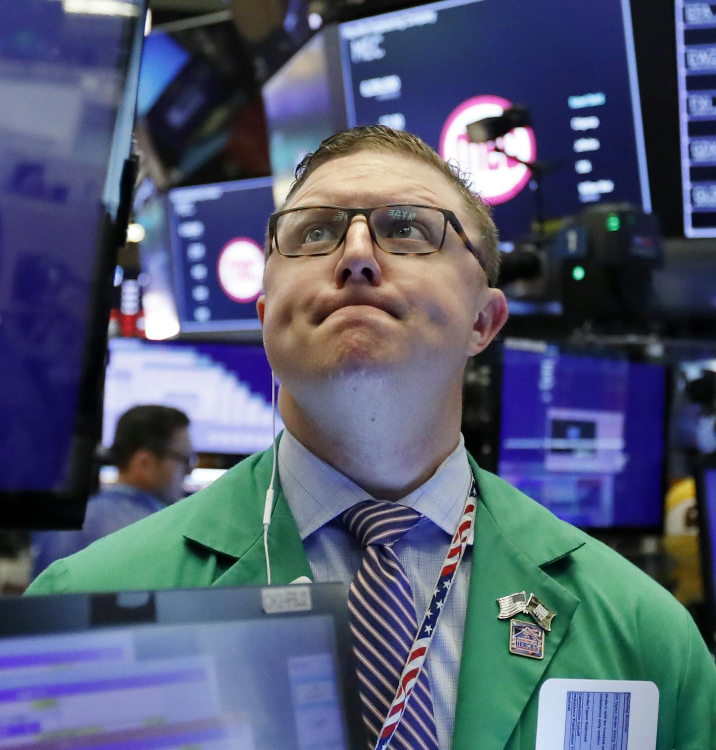 Trader Ryan Falvey works on the floor of the New York Stock Exchange, Thursday, May 9, 2019. Stocks are opening broadly lower on Wall Street as investors keep a close eye on trade talks between the U.S. and China. (AP Photo/Richard Drew) ORG XMIT: NYRD101