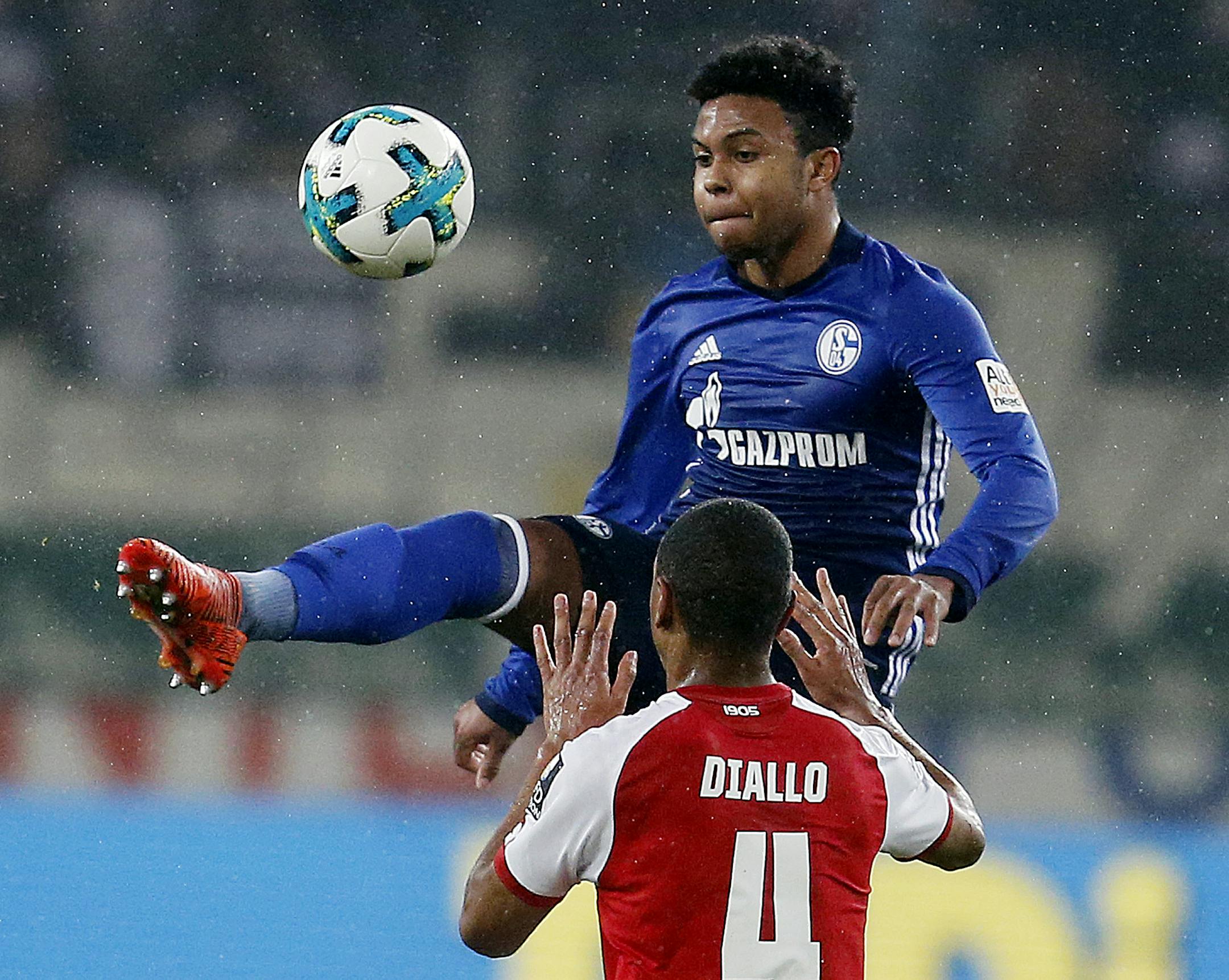 Schalke's Weston McKennie, 20, (top) challenged for the ball with Mainz's Abdou Diallo during a March 2018 Bundesliga match in Mainz, Germany. McKennie is from Texas,