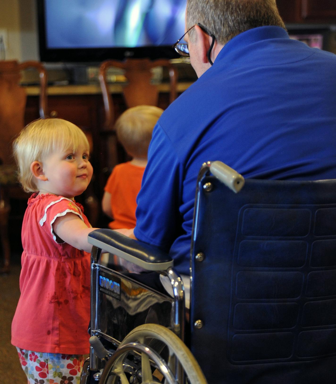 The Ebenezer Society provides a range of housing options from community-based services and senior housing to acute, transitional and long-term care across Twin Cities. Their employees interact with residents in a myriad of ways as part of their daily routines. In a intergenerational event seniors in the Day Care area playfully painted with pudding with preschoolers. Ellie Schwein 2 years old said goodbye to John Grant ] Richard.Sennott@startribune.com Richard Sennott/Star Tribune. , ,Burnsville,