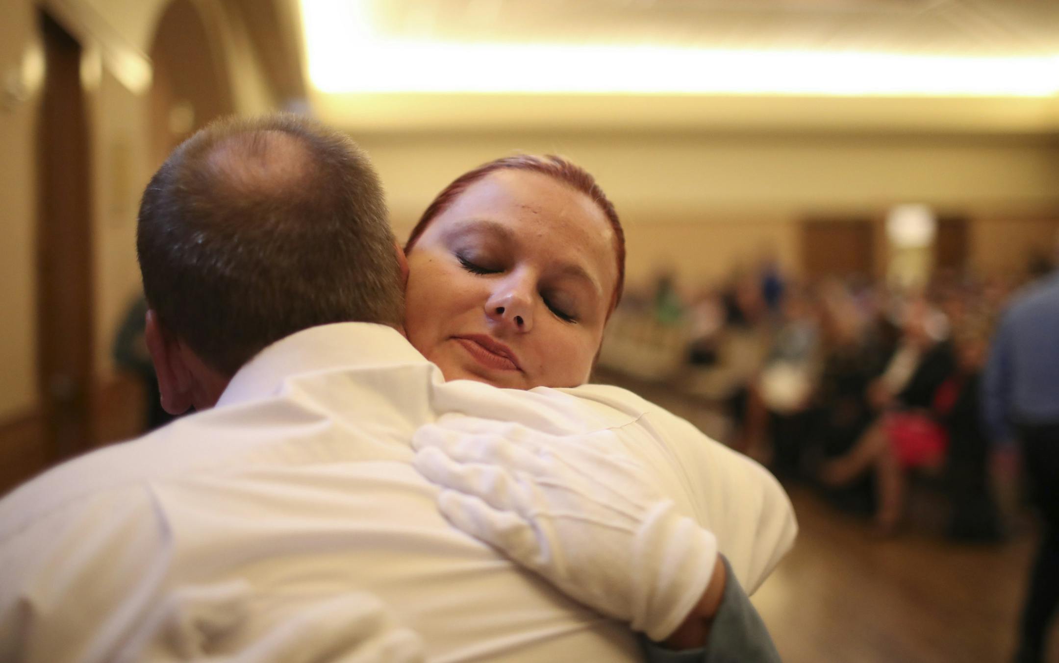 Meghan Smelter hugged her father, retried Minneapolis Police Officer Greg Smelter, after he pinned her police badge on her uniform just before she took the oath of office with the other recruits in her class Wednesday evening. Greg Smelter served in the MPD 25 years before retiring. ] JEFF WHEELER ï jeff.wheeler@startribune.com Eight new members of the Minneapolis Police Department were sworn in Wednesday evening, June 1, 2016 in a ceremony at St. Mary's Greek Orthodox Church. In addition,