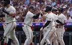 The Twins offense should be strong enough for frequent celebrations like this one following a Royce Lewis grand slam last season.