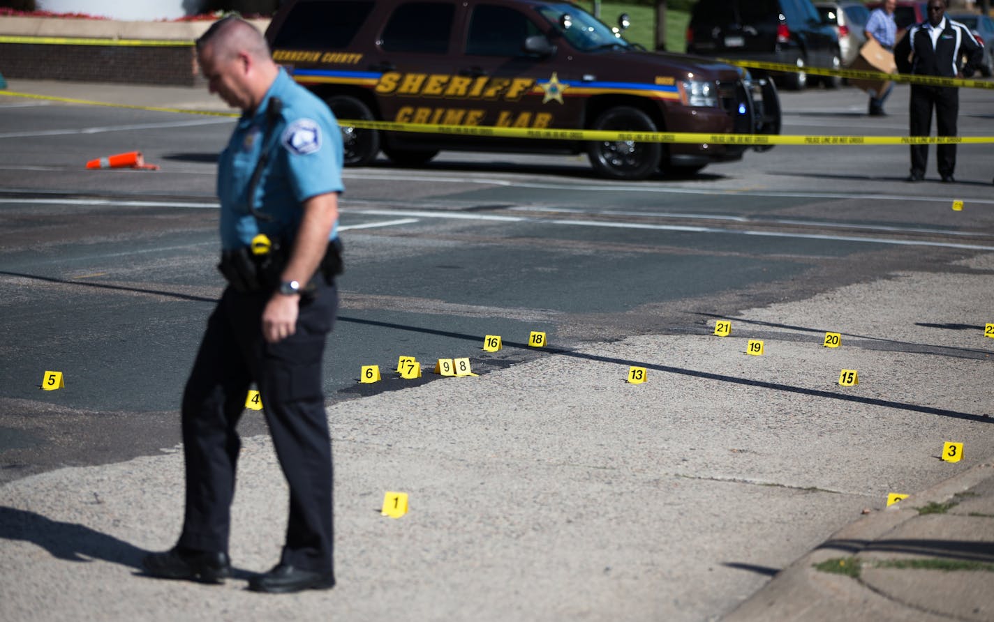 HCMC082714 * Mark Vancleave - mark.vancleave@startribune.com * Minneapolis police investigated shots that were fired at Hennepin County Medical Center in downtown Minneapolis on Tuesday afternoon.on Tuesday, Aug. 26, 2014. [Dozens of shell casings littered South 8th Street.]