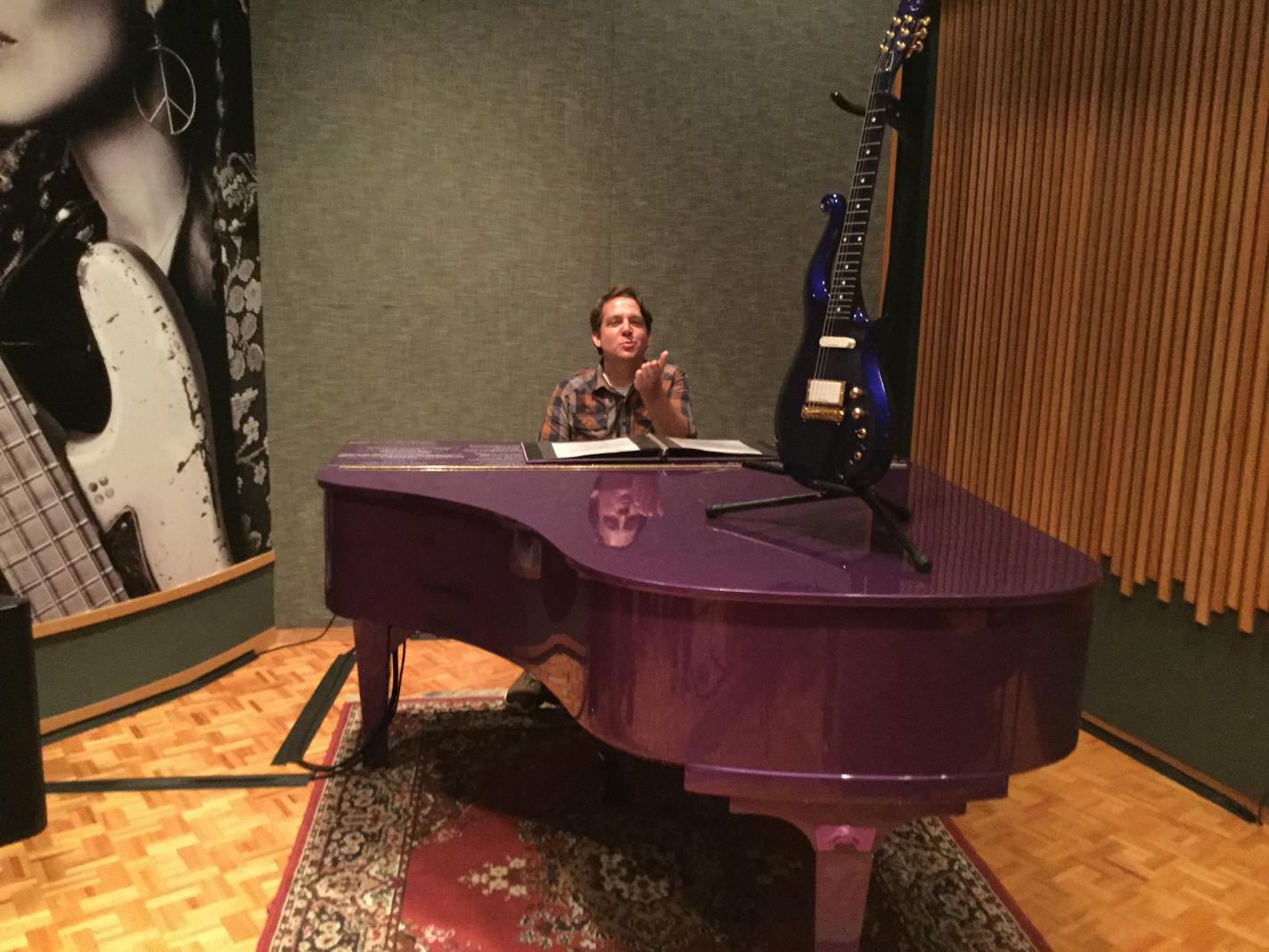 Music Critic Chris Riemenschneider blows a Princely kiss from the purple piano inside Studio B at Paisley Park.