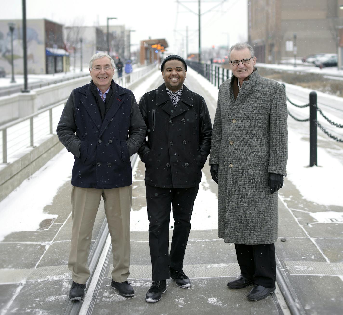 Mike Temali, CEO of Neighborhood Development Center (left) and retired banker Bill Sands (right), have helped business owners like Daymn Johnson owner of Grooming House (center) and other inner-city neighborhoods businesses with business counseling and initial financing over the last 30 years. ]
BRIAN PETERSON &#xa5; brian.peterson@startribune.com
St. Paul, MN Tuesday, January 22, 2019