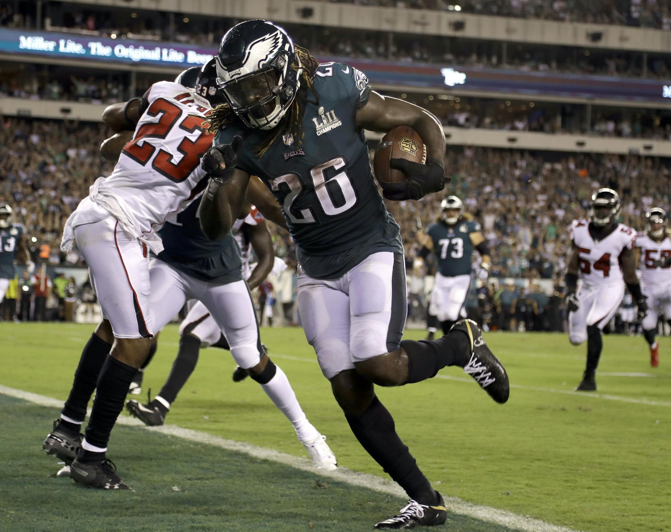 Philadelphia Eagles' Jay Ajayi scores a touchdown during the second half against the Atlanta Falcons in an NFL football game early Friday, Sept. 7, 2018, in Philadelphia. (AP Photo/Matt Rourke)