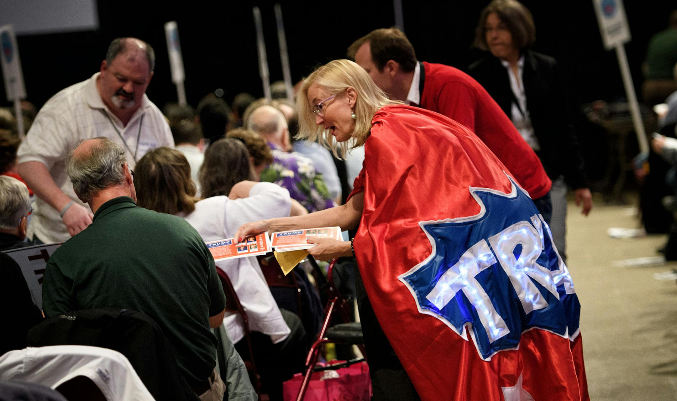 Trump supporter Mary Reher, a delegate from Carver County, handed out Trump literature at the GOP Convention. ] GLEN STUBBE * gstubbe@startribune.com