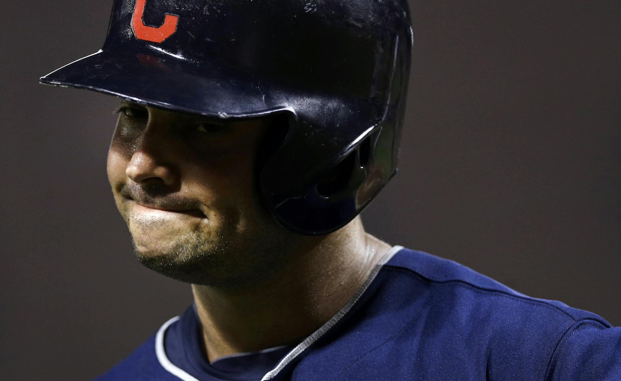 Cleveland Indians' Nick Swisher reacts as he walks off the field after striking out swinging in the eighth inning of a baseball game against the Baltimore Orioles, Tuesday, June 25, 2013, in Baltimore. Baltimore won 6-3. (AP Photo/Patrick Semansky) ORG XMIT: MIN2013071919075827