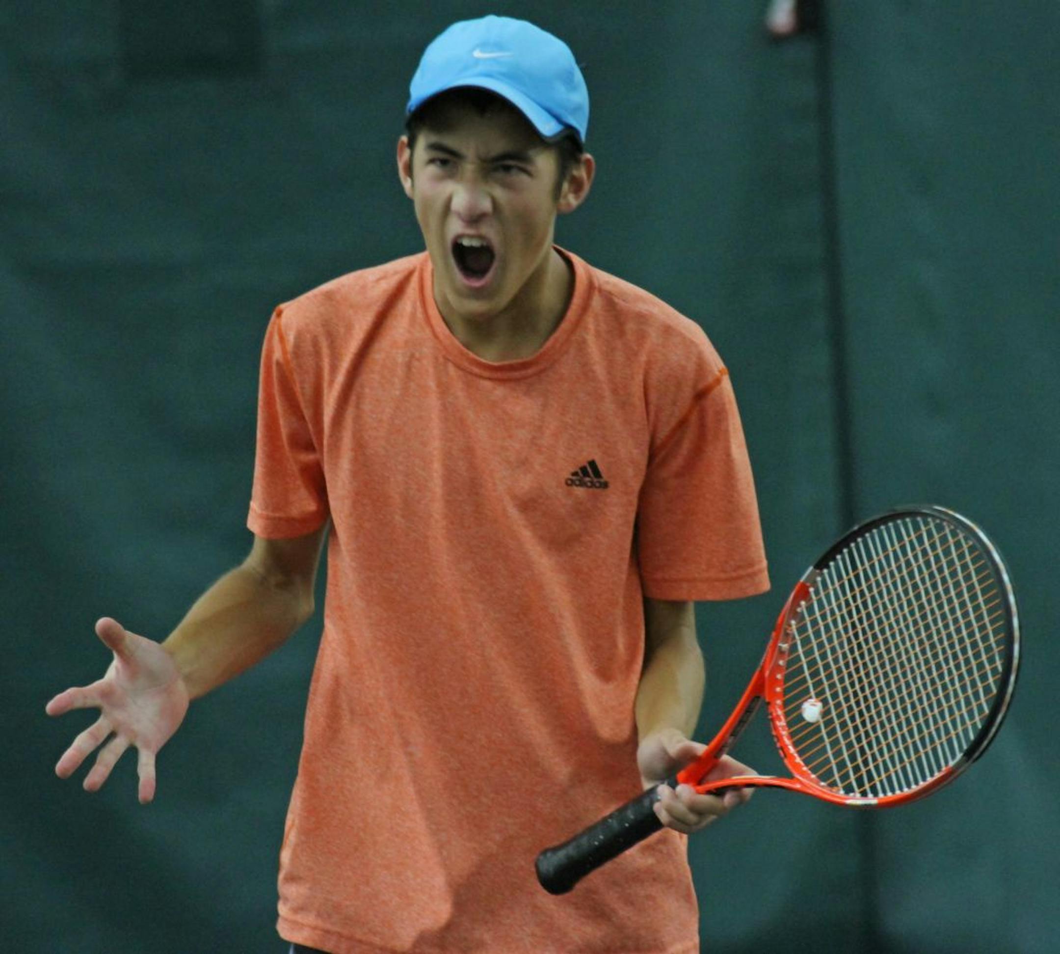 Zach Adkins of Maple Grove, reacted to his shot during the USTA (tennis) Baseline Summer Championships. Age 16 and under boys and girls competed at the level 5 tournament at the Baseline Tennis Center at the University of Minnesota on 7/21/12.