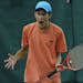 Zach Adkins of Maple Grove, reacted to his shot during the USTA (tennis) Baseline Summer Championships. Age 16 and under boys and girls competed at th