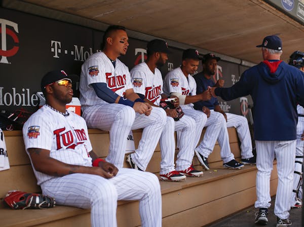 The Twins&#x2019; dugout is filling up with more and more Latin players such as (from left) first baseman/designated hitter Kennys Vargas, right field
