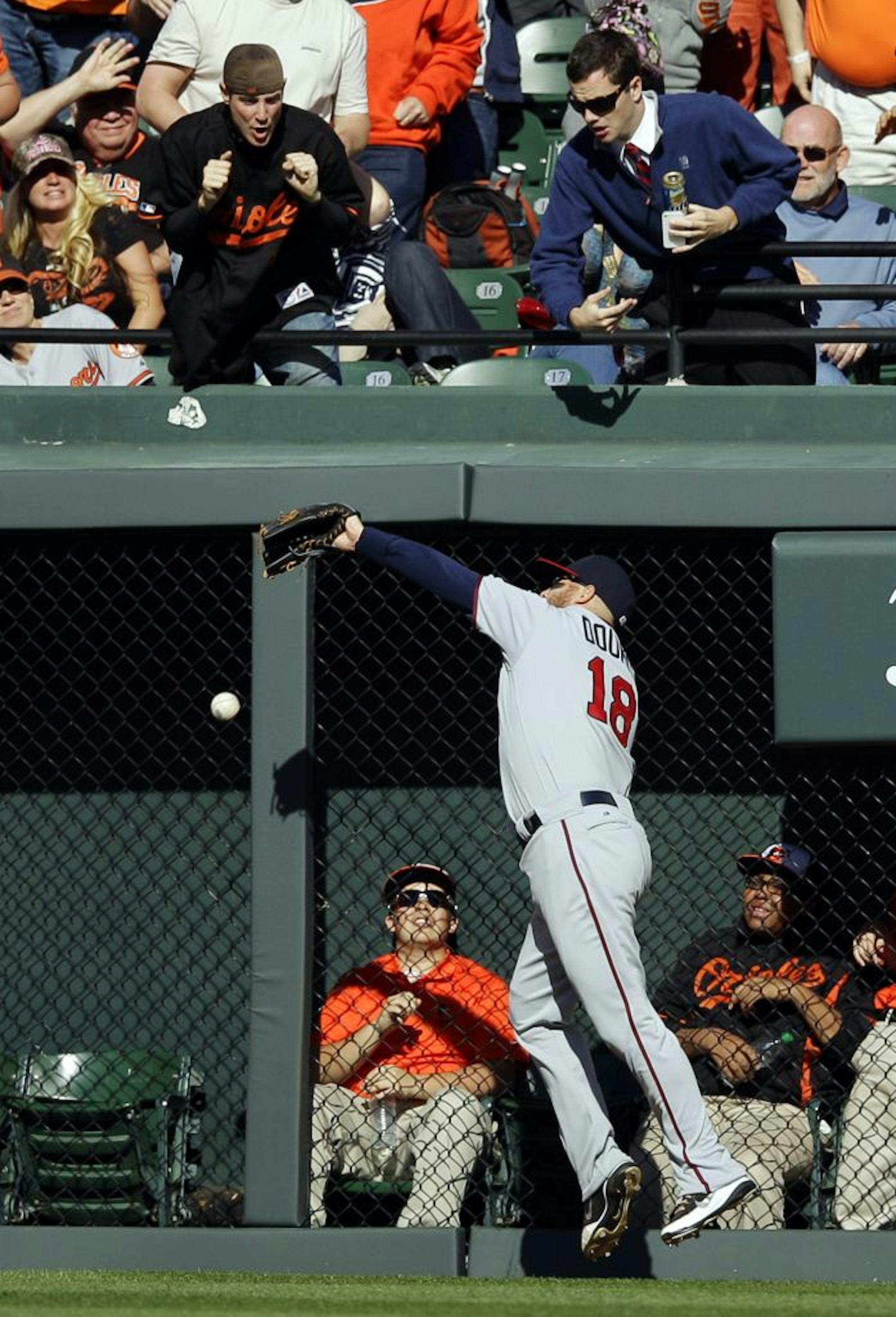 Right fielder Ryan Doumit missed a fly ball hit by the Orioles' Nick Markakis in the sixth inning. It ended up as an RBI triple in the Twins' 4-2 loss on Opening Day.