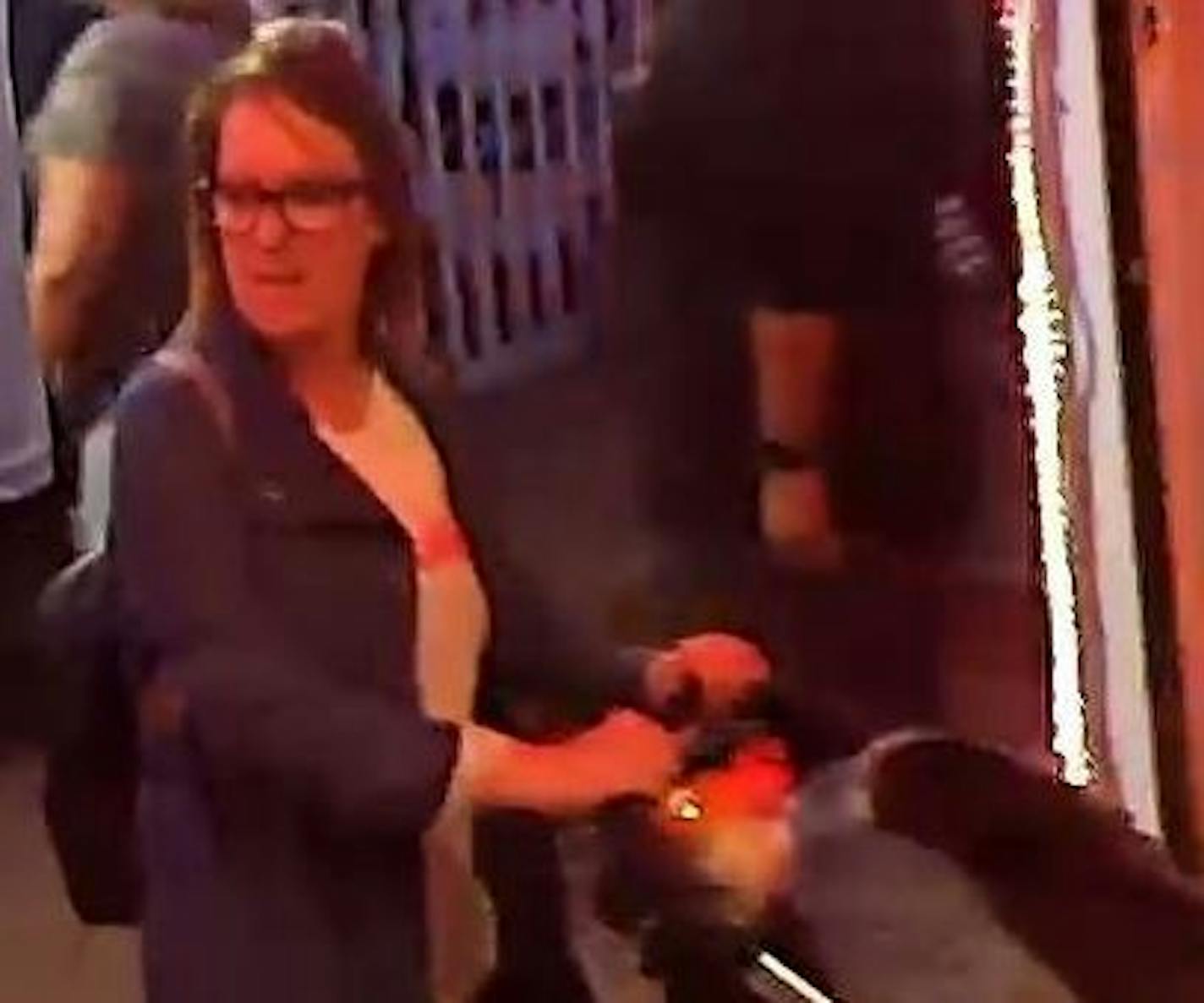 A surveillance image shows a woman suspected of groping a volunteer at the Minnesota Republican Party's booth at the State Fair. Credit: State Fair Police Department