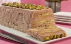 Crisp homemade pistachio wafers form the buliding blocks of this icebox cake. More pistachios go into the chocolate whipped cream layered between the 
