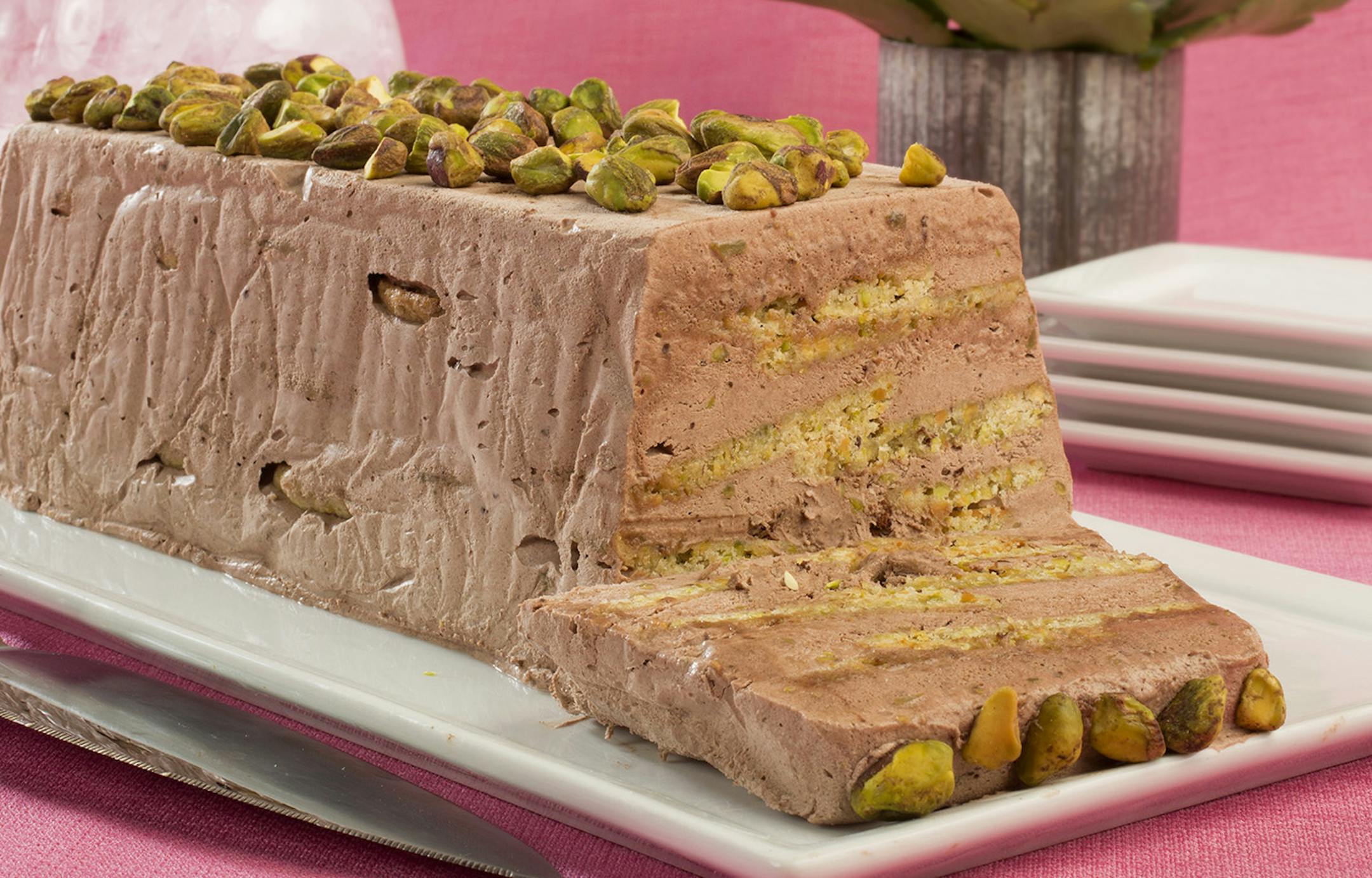 Crisp homemade pistachio wafers form the buliding blocks of this icebox cake. More pistachios go into the chocolate whipped cream layered between the cookies. (Keri Wiginton/Chicago Tribune/TNS) ORG XMIT: 1167360